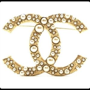 Wanted Authentic Channel brooch